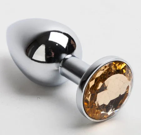 Анальная пробка серебро со вставкой желтый страз S 47019-MM